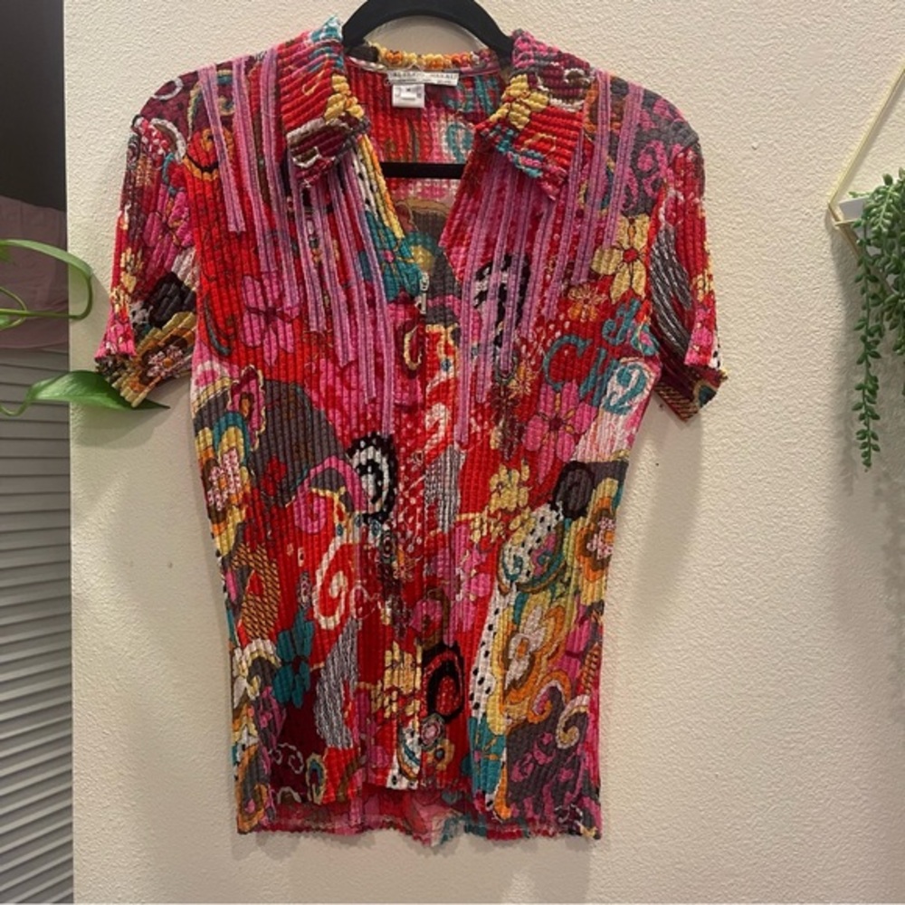 Alberto Malaki top